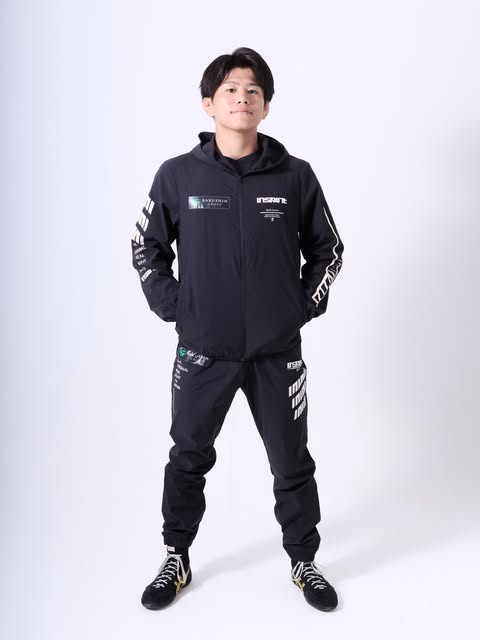 Kotaro Kiyooka in black training apparel